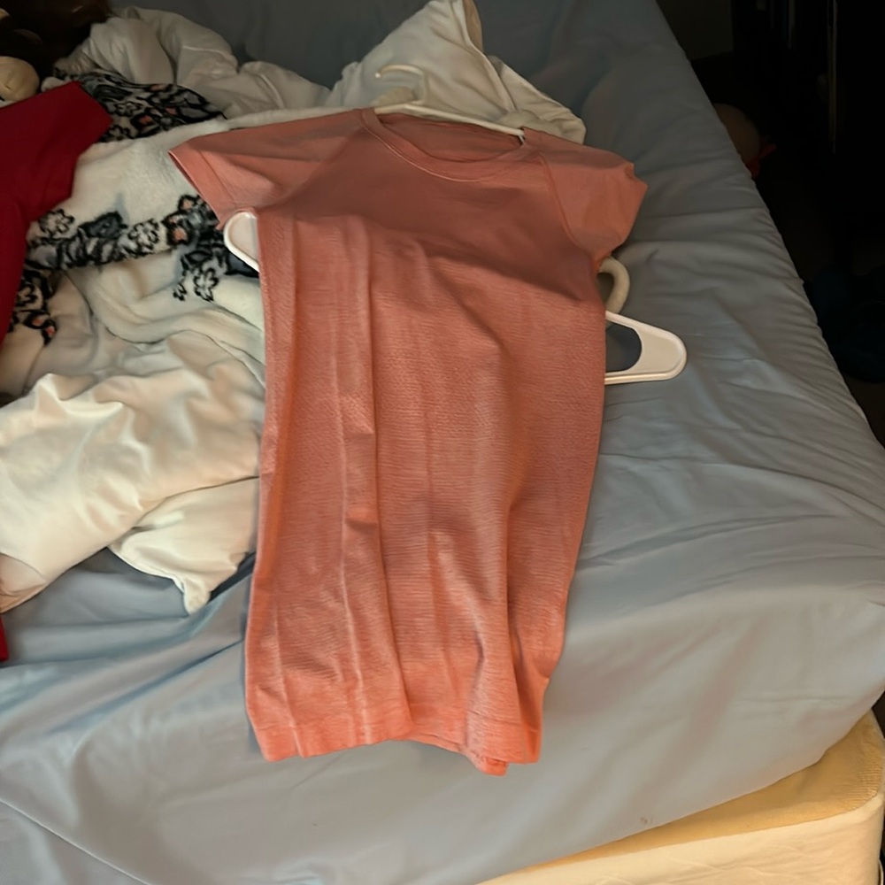 Lululemon light pink swiftly tech size 4